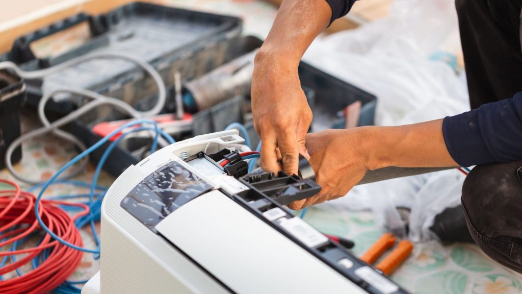 Man installing a new AC Replacement in Prairieville, LA